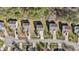 Aerial view of a neighborhood showcasing well-maintained homes with landscaped front yards and tree-lined streets at 264 Farrington Dr, Clayton, NC 27520