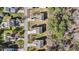 Aerial view of neighborhood with mature trees and well-maintained lawns at 264 Farrington Dr, Clayton, NC 27520