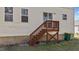 Back porch with wooden stairs at 264 Farrington Dr, Clayton, NC 27520