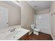 Full bathroom with vanity, toilet, and tub with shower at 264 Farrington Dr, Clayton, NC 27520