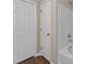 Bathroom featuring a tub and shower with tile surround, and modern fixtures at 264 Farrington Dr, Clayton, NC 27520