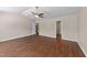 Large bedroom with modern ceiling fan, wood-look floors, and neutral walls at 264 Farrington Dr, Clayton, NC 27520