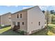 Rear exterior view of home with back deck at 264 Farrington Dr, Clayton, NC 27520
