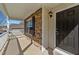 Inviting front porch with stone accents, white railings, and a cozy entrance to the home at 264 Farrington Dr, Clayton, NC 27520
