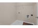 Functional laundry room with hookups and modern flooring at 264 Farrington Dr, Clayton, NC 27520