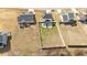 Aerial view of a home with a large backyard and a patio featuring an outdoor kitchen at 277 Martins Mill Ct, Wendell, NC 27591