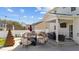 Outdoor living with a patio featuring egg chairs, an outdoor tv, a modern fireplace, and seating at 277 Martins Mill Ct, Wendell, NC 27591