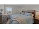 Cozy bedroom with natural light, complete with bed and dresser at 277 Martins Mill Ct, Wendell, NC 27591