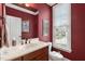 Elegant half bath features a marble countertop, and a bright window with neighborhood views at 306 Village Orchard Rd, Cary, NC 27519