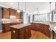 Spacious kitchen with custom cabinets, granite countertops, and island at 306 Village Orchard Rd, Cary, NC 27519