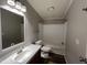 This bathroom has a tub and shower combination with a vanity with a large mirror at 3211 Kipling Rd, Fuquay Varina, NC 27526