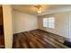 Bright and airy living room with laminate floors and ample natural light at 3211 Kipling Rd, Fuquay Varina, NC 27526
