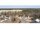 Scenic aerial view showcases home in a cul-de-sac, with a spacious lot, privacy fence and lush surrounding landscape at 33 Song Breeze Cir, Angier, NC 27501