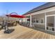 Large deck with grilling area, seating, and screened-in porch at 33 Song Breeze Cir, Angier, NC 27501