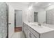 Clean bathroom featuring a double sink vanity and good lighting at 33 Song Breeze Cir, Angier, NC 27501