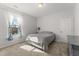 Simple bedroom with carpet, window, and closet space at 33 Song Breeze Cir, Angier, NC 27501