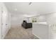 Open bonus room with plush carpeting, recessed lighting, and staircase view at 33 Song Breeze Cir, Angier, NC 27501