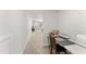 Hallway featuring a craft area with sewing machine and cutting materials next to the living area at 33 Song Breeze Cir, Angier, NC 27501