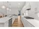 The kitchen boasts ample counter space, stainless appliances and an island with pendant lights at 33 Song Breeze Cir, Angier, NC 27501