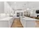 The bright kitchen offers lots of storage, stainless appliances, an island and pendant lighting at 33 Song Breeze Cir, Angier, NC 27501