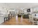 The open living room shows a fireplace, recessed lights, neutral walls, and wood flooring at 33 Song Breeze Cir, Angier, NC 27501