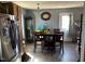 Inviting dining room featuring hardwood floors and a modern chandelier creating a cozy atmosphere at 402 Todd Hill Dr, Wendell, NC 27591