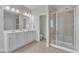 This bright bathroom features a glass shower, double vanity and ample storage at 413 Westfalen Dr, Cary, NC 27519