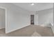 Bright carpeted bedroom with neutral walls and trim at 413 Westfalen Dr, Cary, NC 27519