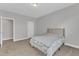 Bedroom with plush carpet, natural light, and neutral decor at 413 Westfalen Dr, Cary, NC 27519
