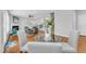 Bright living room featuring a fireplace, hardwood floors, and stylish decor at 413 Westfalen Dr, Cary, NC 27519