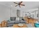 Open living space showcases a comfortable sofa and connections to other rooms at 413 Westfalen Dr, Cary, NC 27519
