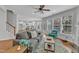 Open floor plan features living room with hardwood floors and fireplace at 413 Westfalen Dr, Cary, NC 27519