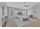 Spacious and serene main bedroom boasts large windows and stylish decor at 413 Westfalen Dr, Cary, NC 27519
