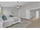 Well-lit main bedroom with a view of the hallway and stylish furnishings at 413 Westfalen Dr, Cary, NC 27519