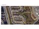 Street view of property at 413 Westfalen Dr, surrounded by lush trees, residential houses, and street markings at 413 Westfalen Dr, Cary, NC 27519