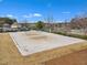 Community sand volleyball court area with net and marked boundaries, providing residents with an outdoor recreation opportunity at 413 Westfalen Dr, Cary, NC 27519