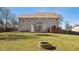 Expansive backyard with a trampoline and fire pit at 424 Crystal Spring Dr, Sanford, NC 27332