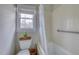 Bright bathroom featuring tub and shower combination with tile surround and natural light from a window at 48 Margaret Pl, Chapel Hill, NC 27516