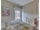 Comfortable bedroom featuring a floral patchwork quilt, window, closet, and decor at 48 Margaret Pl, Chapel Hill, NC 27516