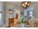 Inviting dining room featuring a wooden table, decorative shelf, and seamless flow into the living spaces at 48 Margaret Pl, Chapel Hill, NC 27516