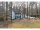 Charming home surrounded by mature trees and a well-manicured yard at 48 Margaret Pl, Chapel Hill, NC 27516