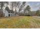 Charming two-story home featuring a well-maintained lawn with mature trees at 48 Margaret Pl, Chapel Hill, NC 27516