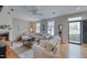Inviting living room with a fireplace, hardwood flooring, and plenty of natural light at 48 Margaret Pl, Chapel Hill, NC 27516