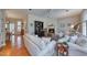 Open concept living room with hardwood floors, recessed lighting, and easy access to other living spaces at 48 Margaret Pl, Chapel Hill, NC 27516