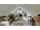 Bright living room with sofa, chair, and desk, with charming rug on carpet at 48 Margaret Pl, Chapel Hill, NC 27516
