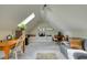 Bright living room with skylight, sofa, desk and charming rug on carpet at 48 Margaret Pl, Chapel Hill, NC 27516