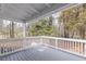 The back porch offers a great view of the trees on the property at 4814 Fayetteville Rd, Durham, NC 27713