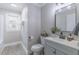 Renovated bathroom with new fixtures and modern finishes for a fresh, clean look at 4814 Fayetteville Rd, Durham, NC 27713