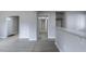 Hallway leading to the home's entry with easy access to all rooms at 4814 Fayetteville Rd, Durham, NC 27713