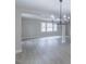 Bright living room with open layout, recessed lighting, and large windows offering great views at 4814 Fayetteville Rd, Durham, NC 27713